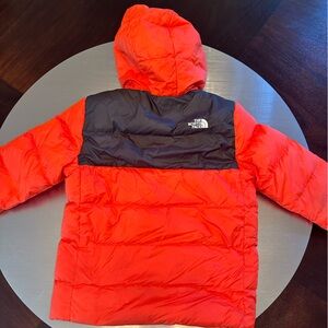Boys north face puffer. Lined. Red/black. Great condition.